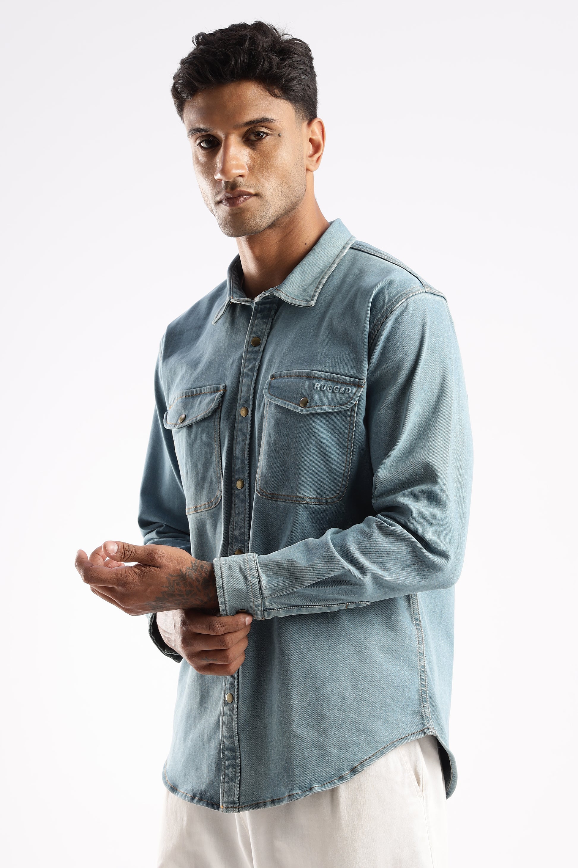 Back view of Skybound Indigo denim shirt highlighting structured shoulders and yoke