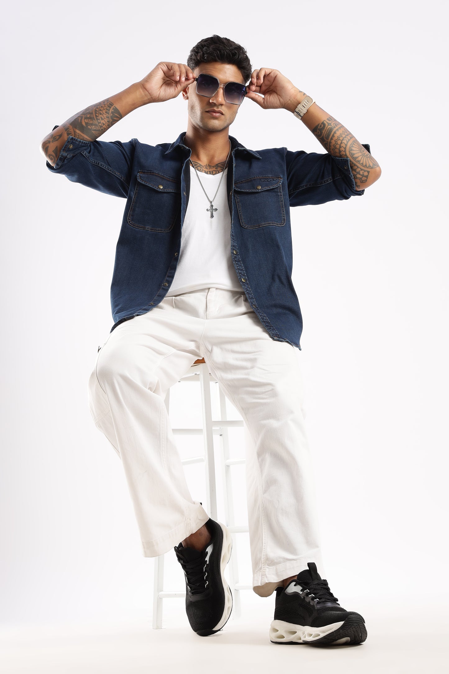 Close-up of Midnight Forge denim fabric showing durable stitching and textured weave