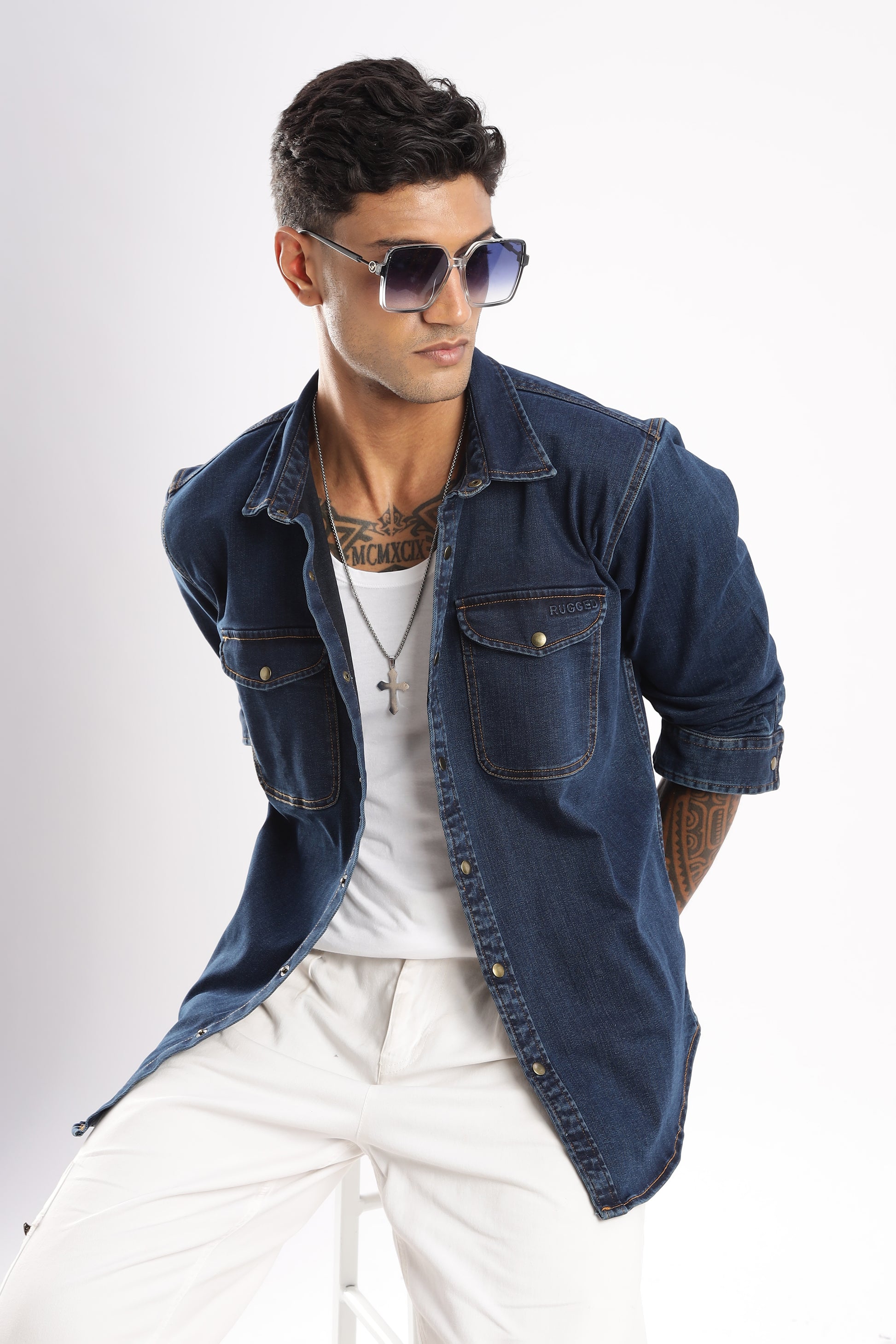 Men’s dark blue denim shirt with utility chest pockets and snap closures in Midnight Forge