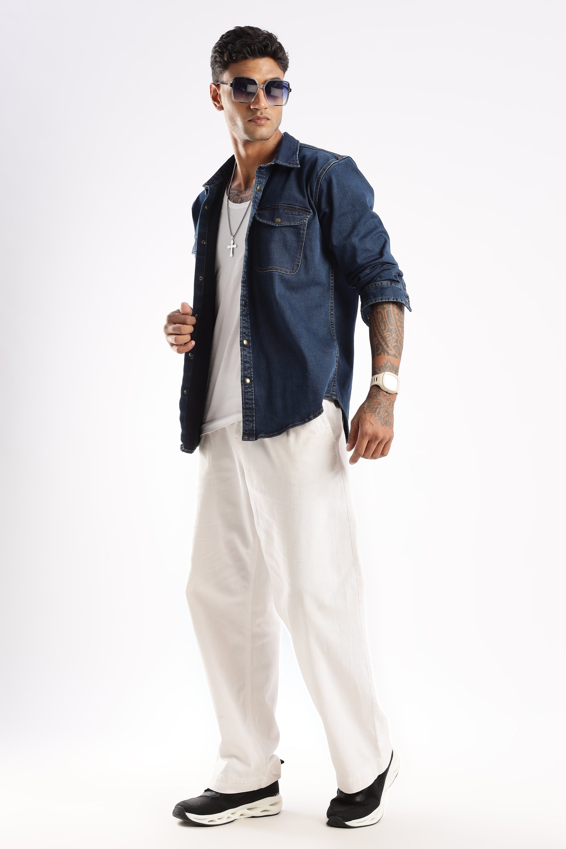 Casual look featuring Midnight Forge denim shirt paired with neutral pants