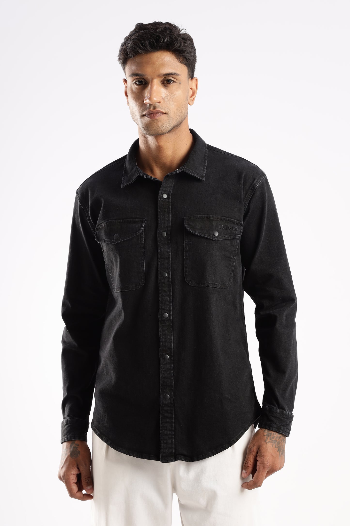 Model wearing Premium Denim Shirt in Obsidian Edge with snap buttons and utility pockets