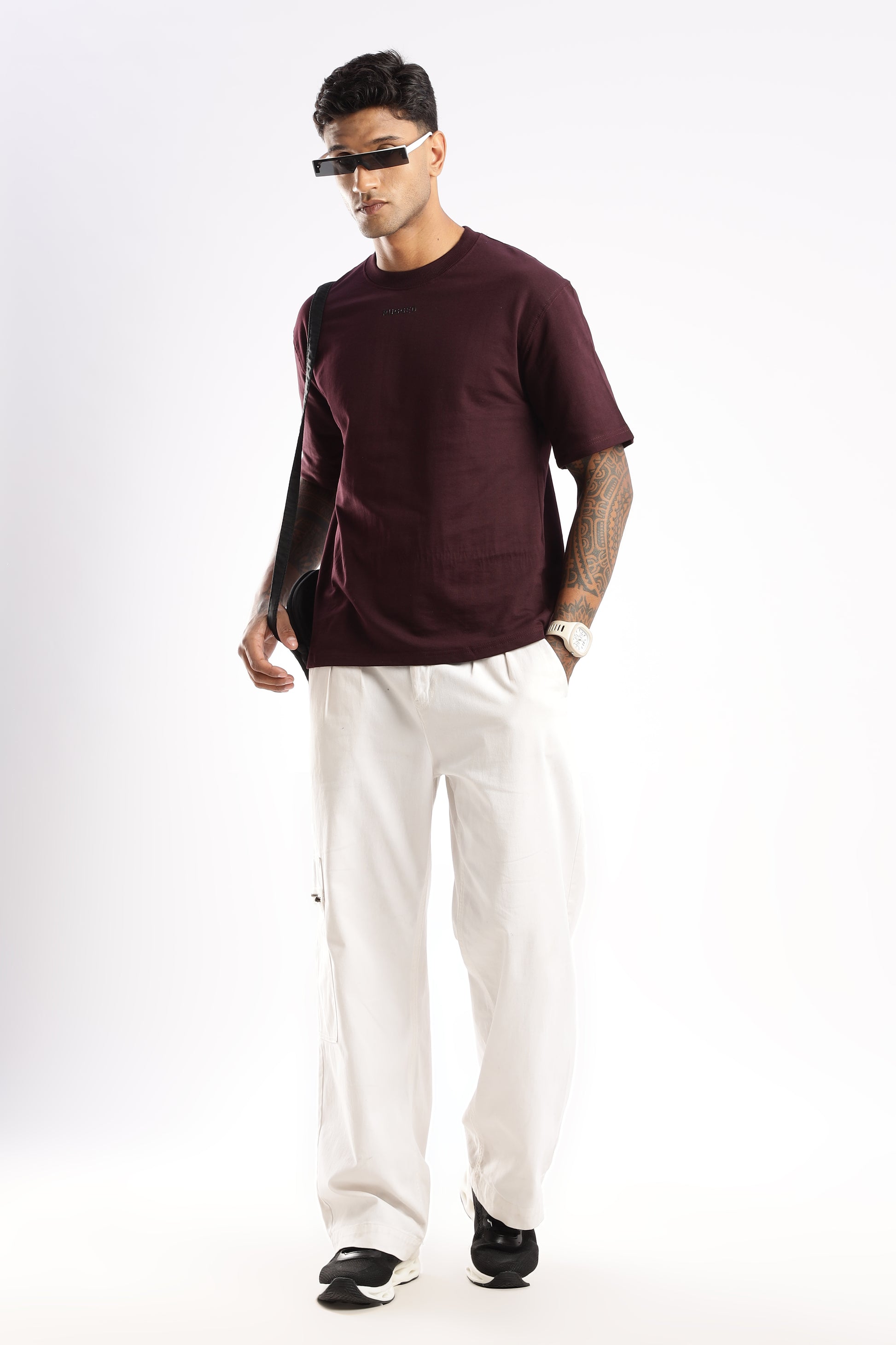 Bold red crew neck tee in Crimson Peak paired with jeans for modern casual look