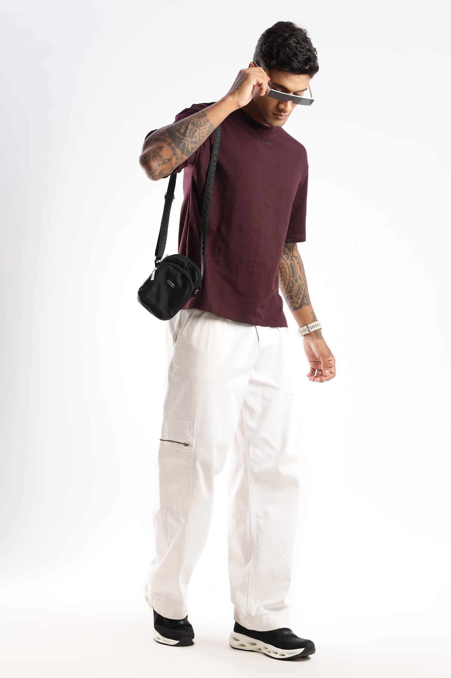 Flat lay of Elegant Crew Tee in Crimson Peak showing neckline, sleeve cut, and label