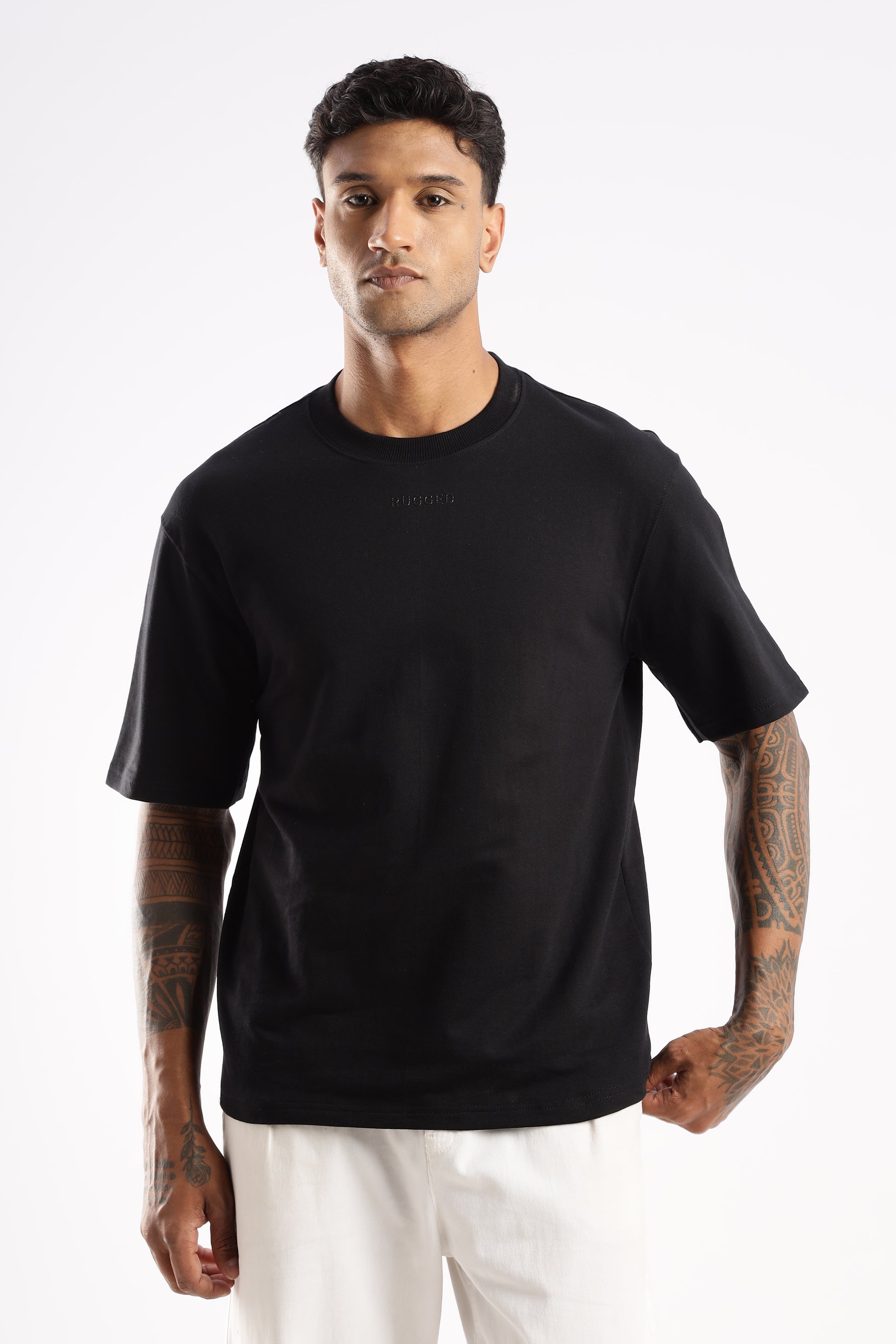 Model wearing Elegant Crew Tee in Onyx Depth with classic crew neck and tailored fit