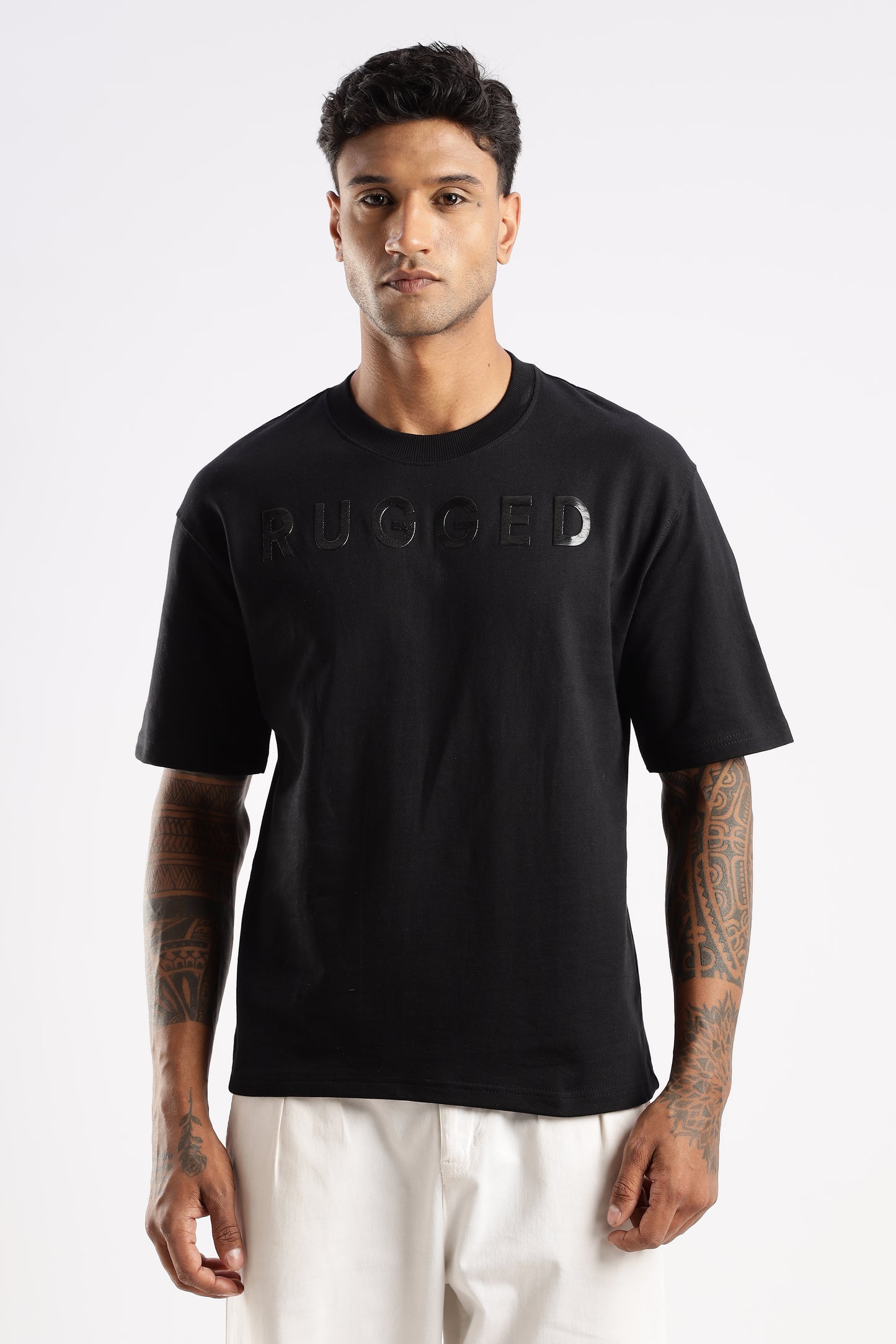 Model wearing Signature Crew Neck T-shirt in Onyx Depth with bold front chest print