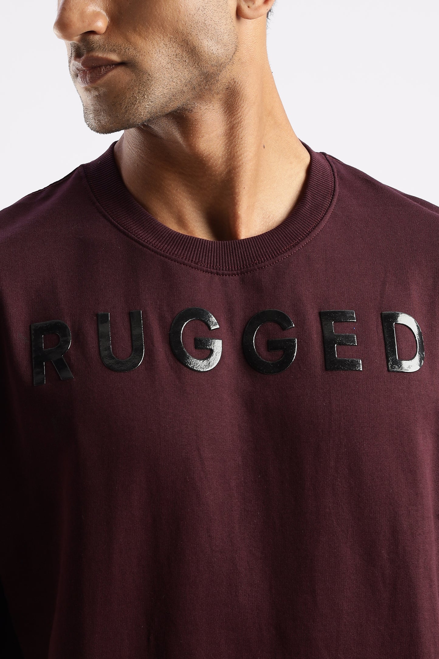 Close-up of Crimson Peak Signature Tee highlighting durable stitching and fabric texture