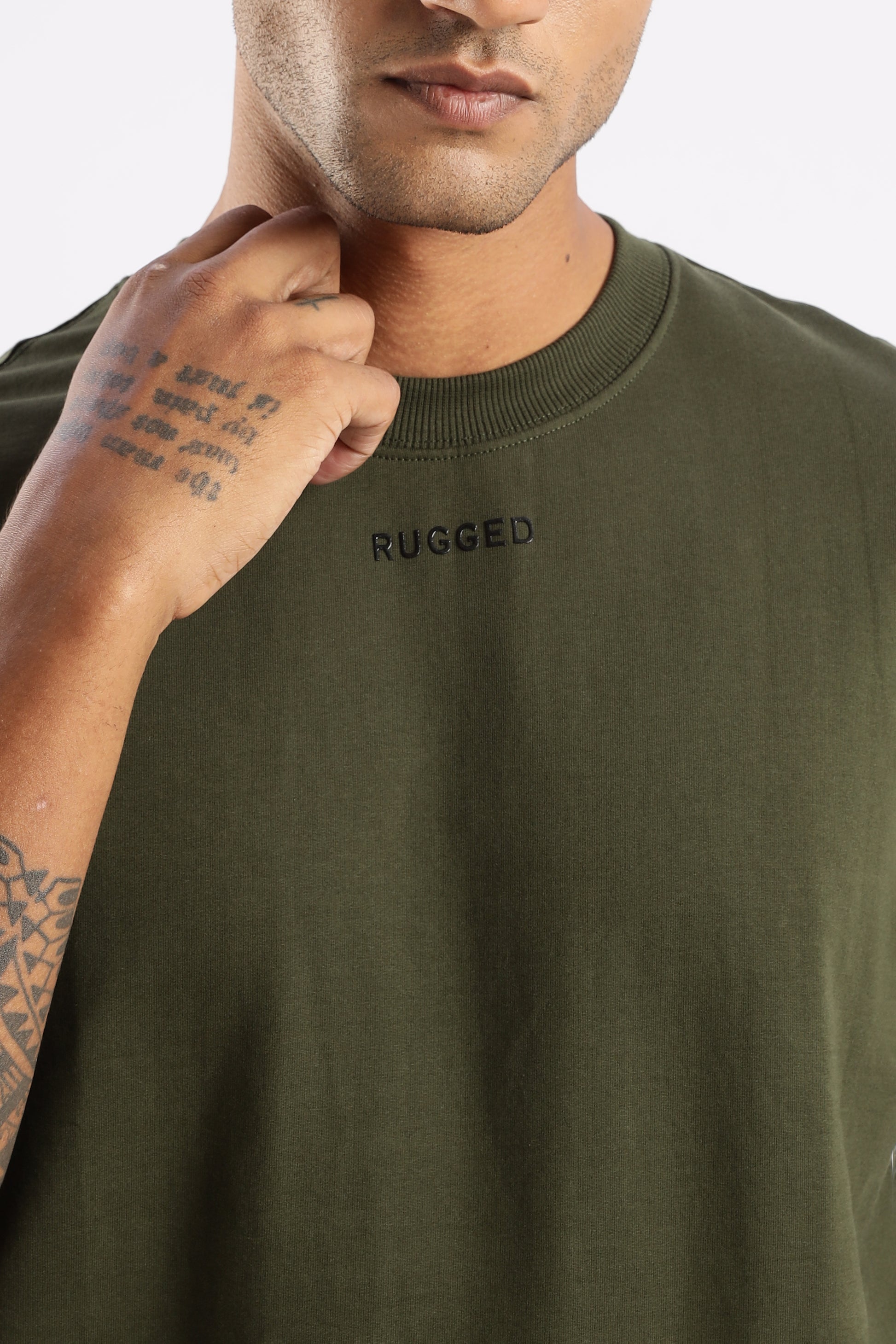 Men’s crew neck tee in Evergreen Mist with minimalist chest print and clean silhouette