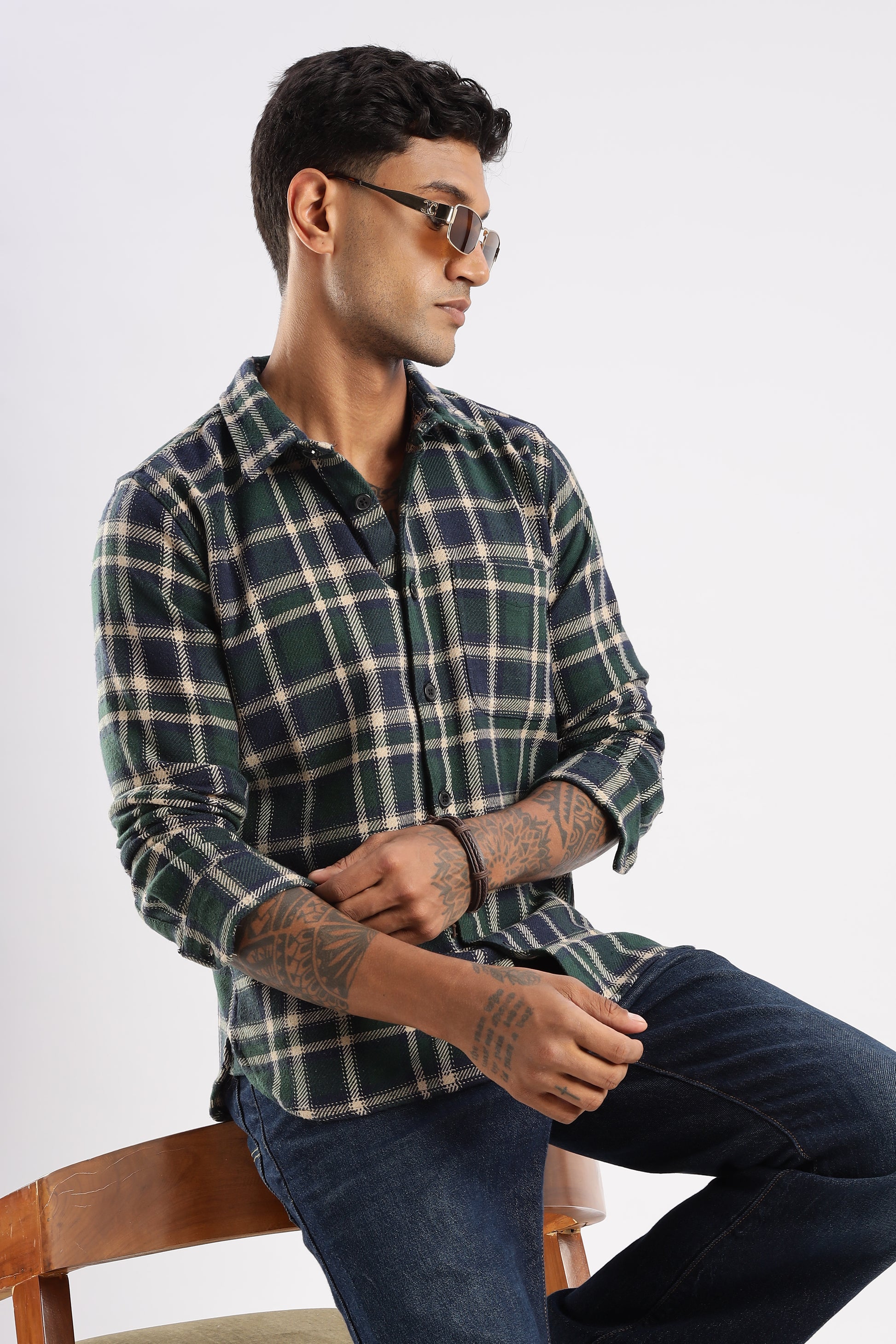 Flat lay of Forest Canopy flannel shirt highlighting button details and fabric weave

