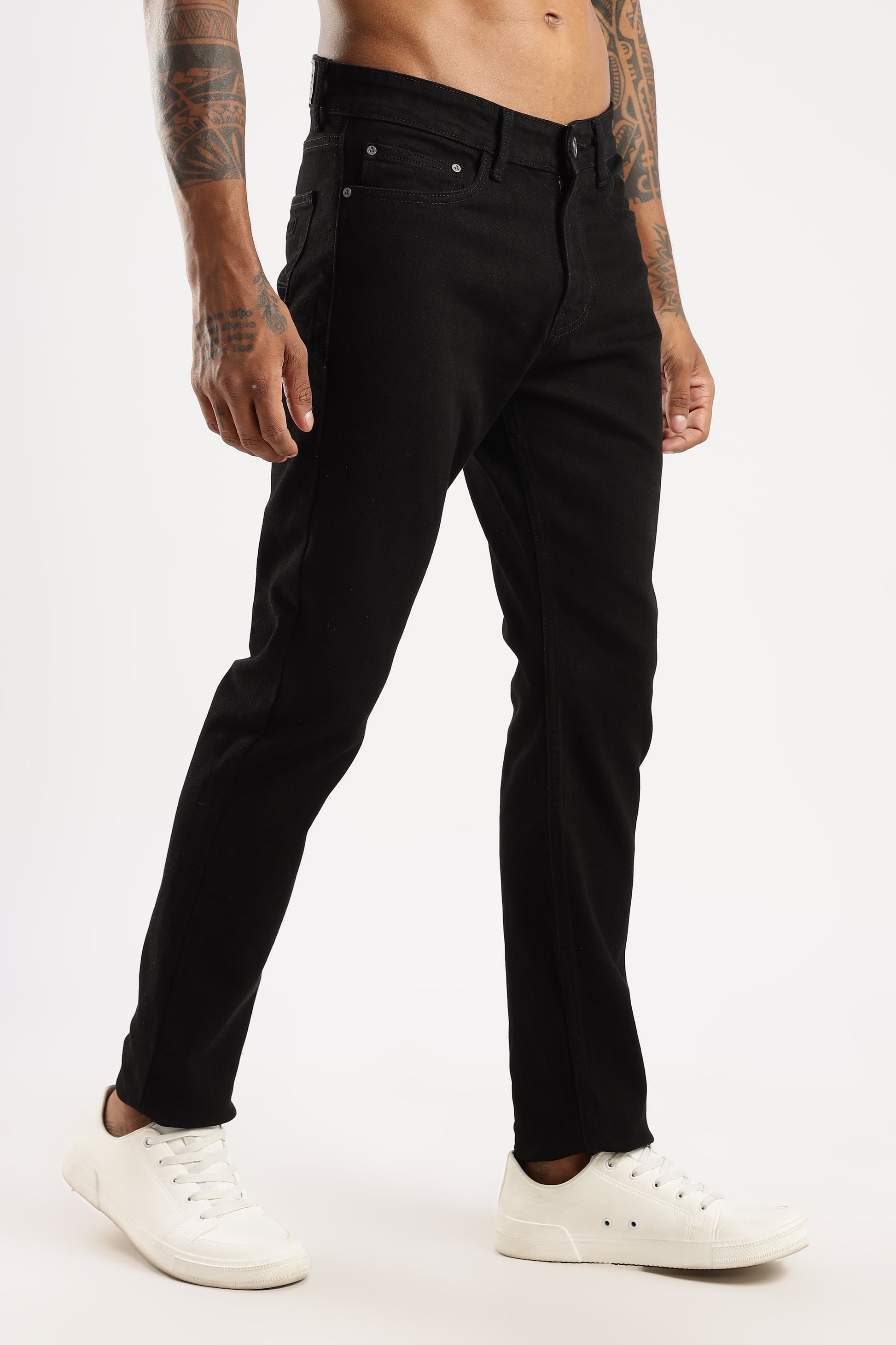 Flat lay of Shadow Trail tapered jeans with classic five-pocket styling