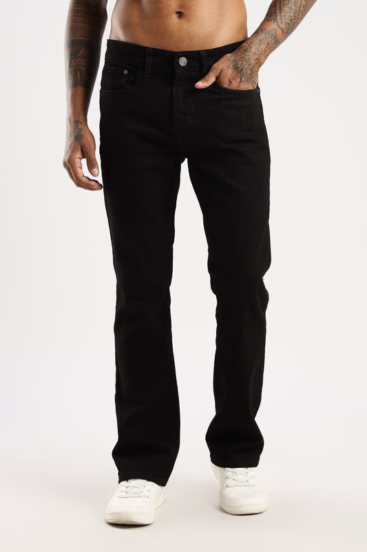 Model wearing Sleek Bootcut Fit Jeans in Shadow Trail with classic bootcut silhouette
