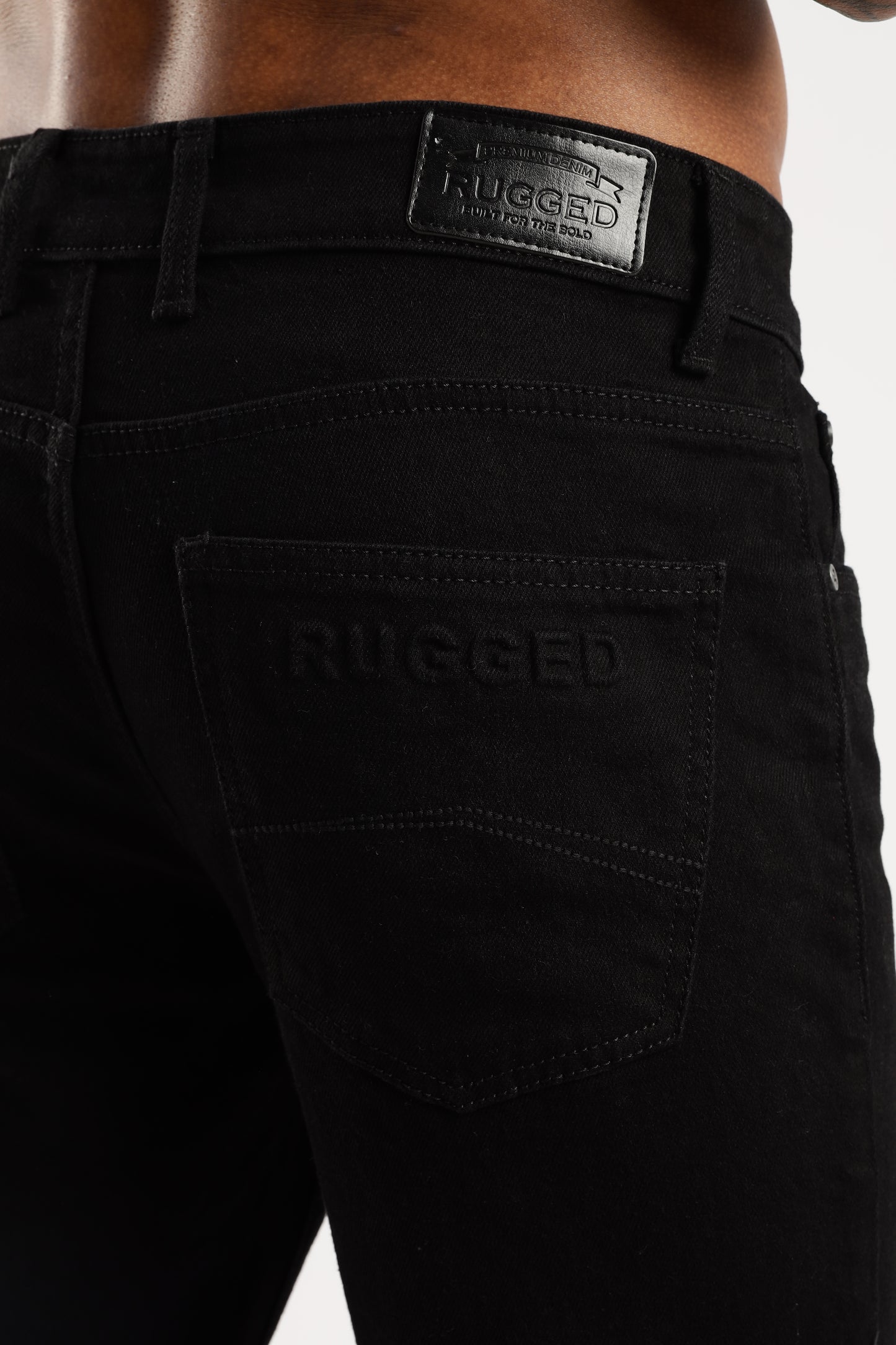 RUGGED model showcasing Steel Wave straight fit jeans with timeless straight leg design

