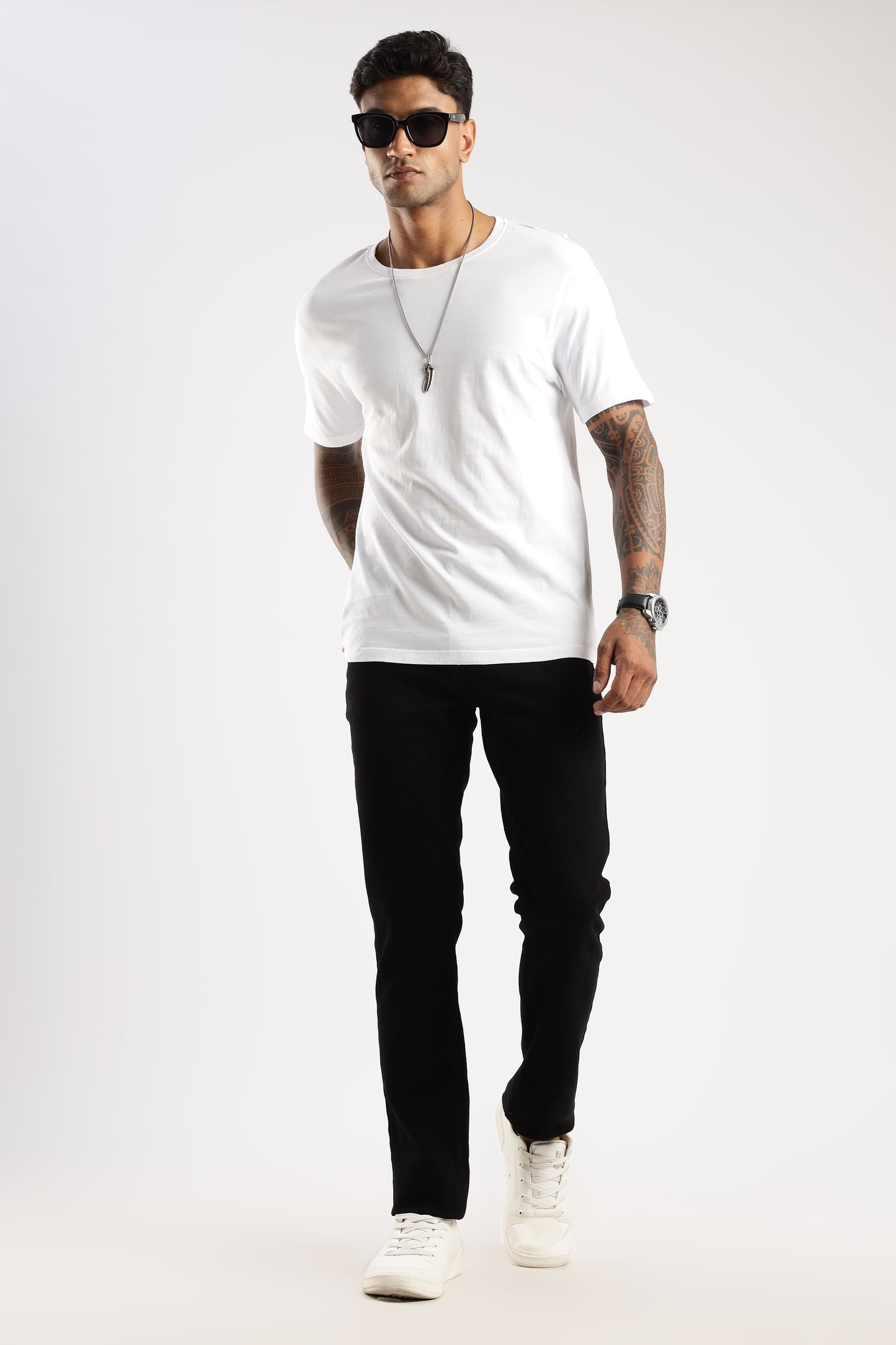 Casual look with model in Steel Wave straight leg jeans, showcasing Sleek Straight Fit