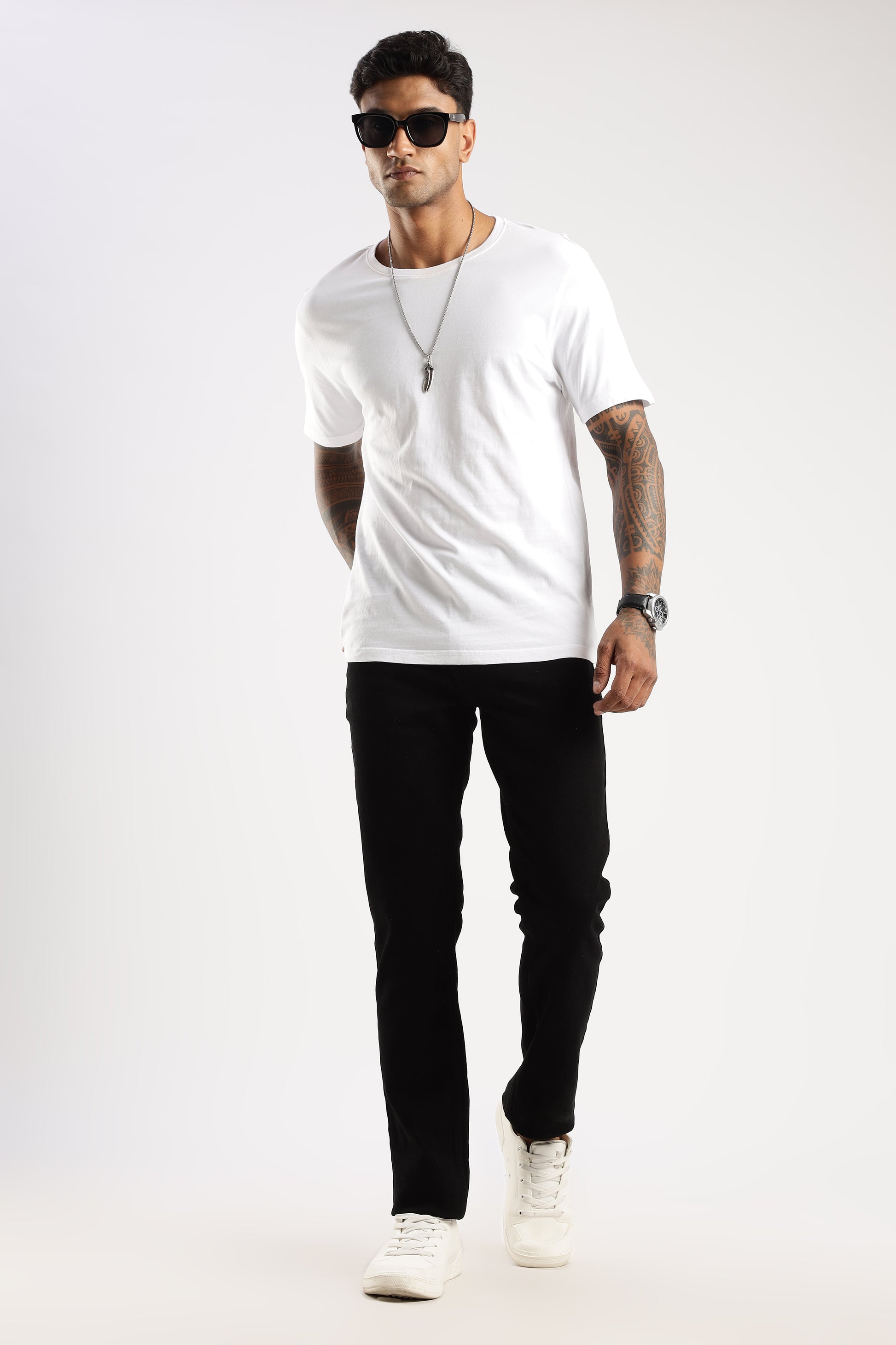 Casual look with model in Steel Wave straight leg jeans, showcasing Sleek Straight Fit