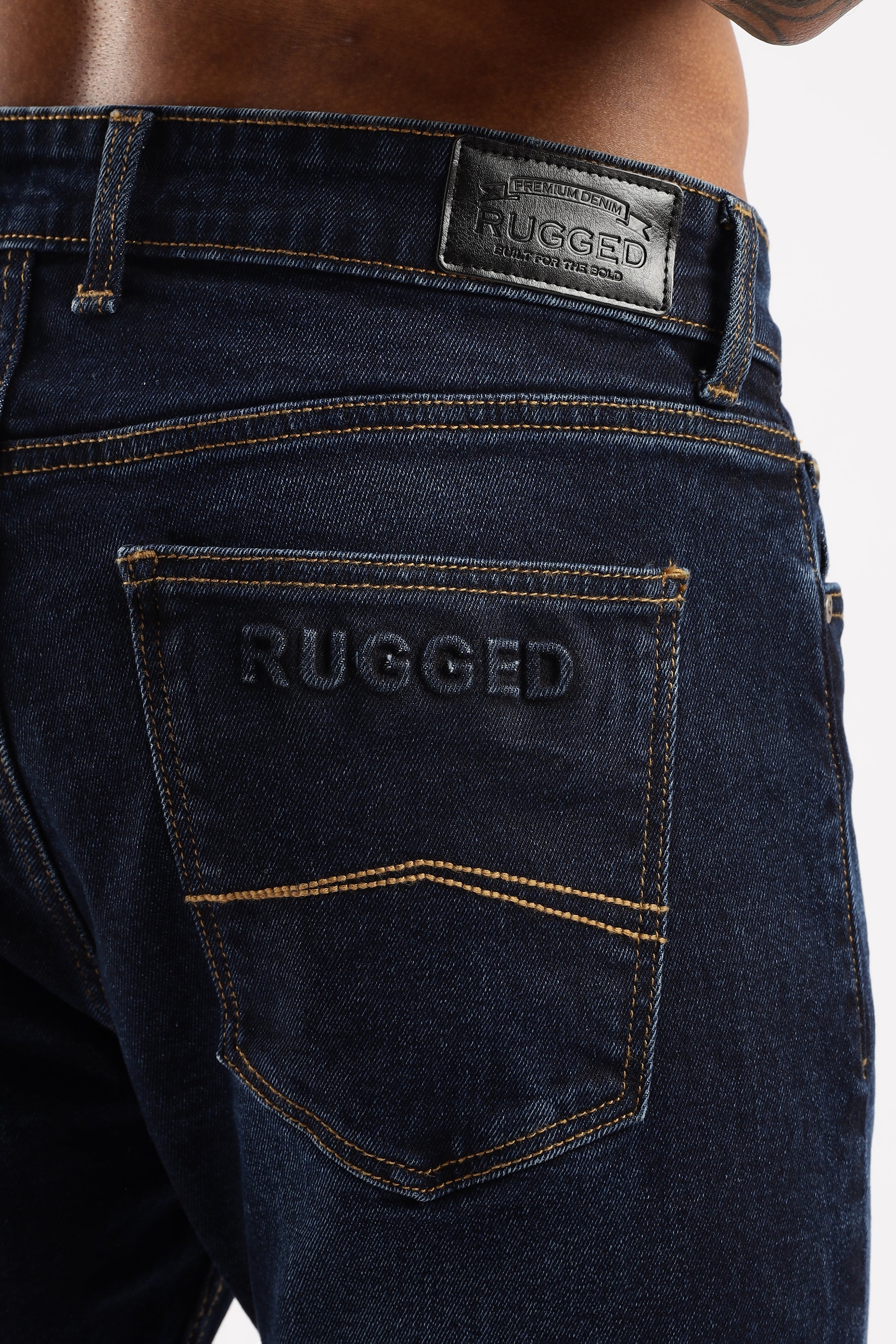 RUGGED Sleek Tapered Fit Jeans in cool-toned Steel Wave, styled for urban versatility