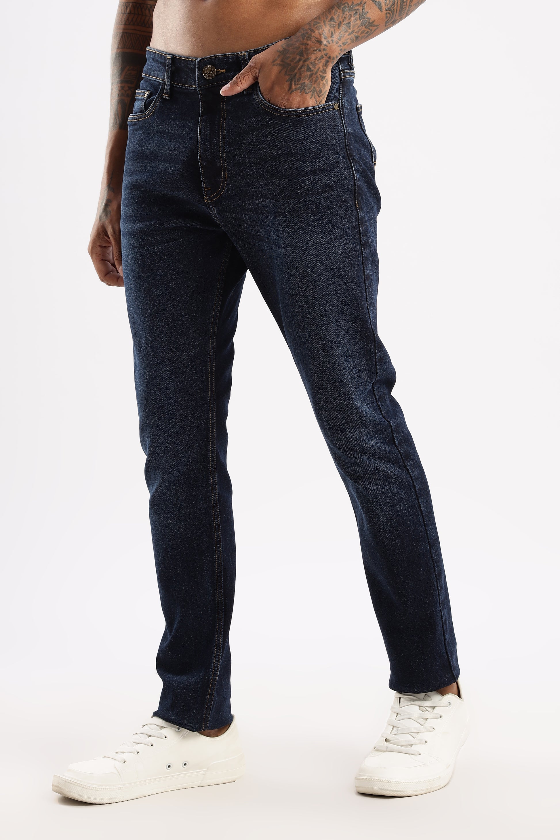 Side view of Steel Wave jeans highlighting the sleek taper from thigh to ankle