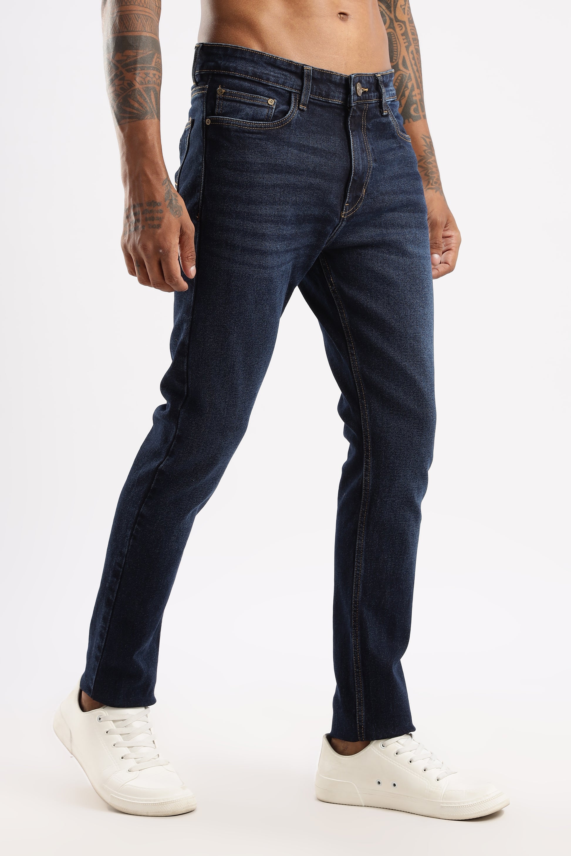 Back angle of Sleek Tapered Fit Jeans in Steel Wave showing pocket detailing and fit